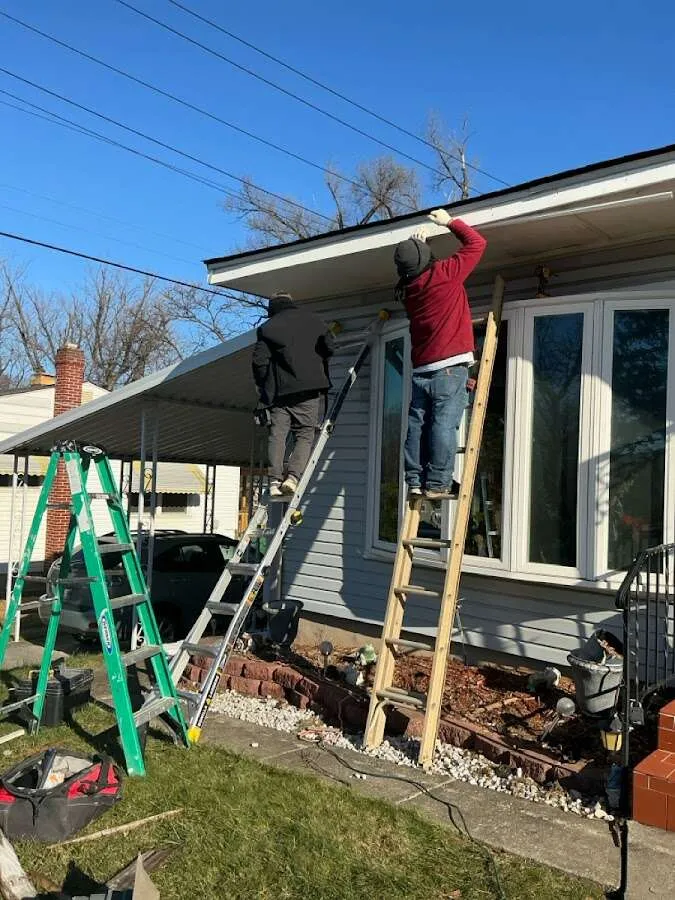 Restoration crew performing exterior repair in Greenville
